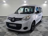 a picture of a small white van parked in a garage