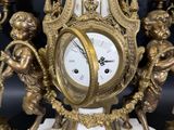 a clock that is sitting on top of a table