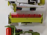 three different types of farm equipment on a white surface