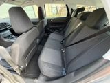 the back seats of a car with a seat belt in the back