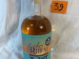 a bottle of liquor that is sitting on a table