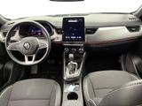 the interior of a car with a steering wheel, dashboard, and dashboard controls