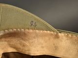 a close up of a hat with the number 32 on it