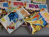 a lot of comic books sitting on a table