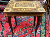 a table that has a small wooden table on it
