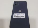 the back of a motorola phone with a barcode on it