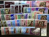 an image of a picture of a collection of stamps on a table