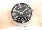 a close up of a watch on a person ' s wrist
