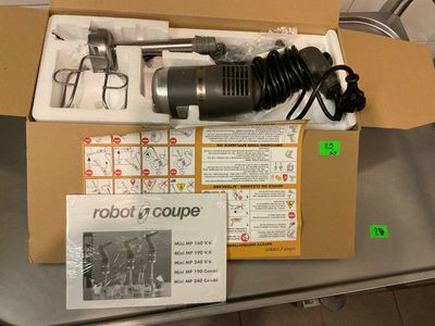 a box that has some tools in it on a table