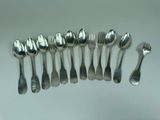 a lot of spoons and spoon spoons on the table
