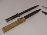 several different types of knives are displayed on a white surface