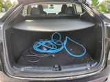 a car trunk with a bunch of wires in it