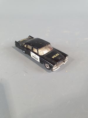 a small toy car that is sitting on a table