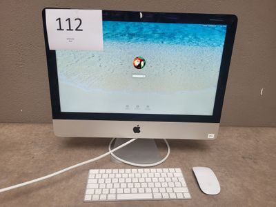a computer with a mouse and a keyboard on the desk