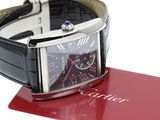 a watch that is sitting on top of a red box