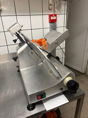 a machine that is sitting on a table in a kitchen