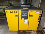 a yellow machine that is sitting in a room