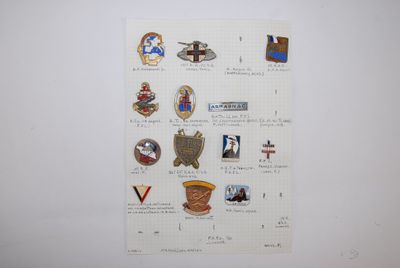 an image of a piece of paper with a bunch of pins on it