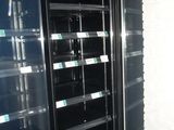an image of an empty refrigerator in a room