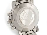 an image of a close up of a wrist watch on a white surface