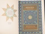 an open book with a picture of a star on it