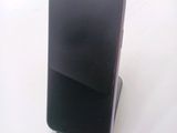 a cell phone that is sitting on top of a stand