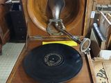 a record player that is sitting on top of a table
