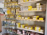 many boxes of food on the shelves in the store