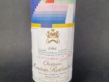 a bottle of wine that is sitting on a table