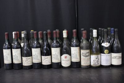 many bottles of wine lined up on a table