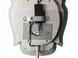 an image of a metal object with wires attached to it