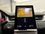 the dashboard of a car with a display of a car ' s camera