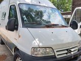 a white van that is parked in the parking lot