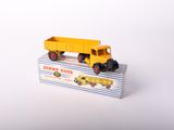 a toy truck that is sitting on top of a box