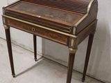 a small desk with a wooden top and metal legs