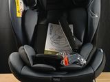 a baby car seat that is sitting on a table