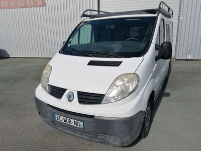 a picture of a white van parked in front of a building