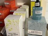 many different types of skin care products on a shelf