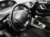 the interior of a car with a steering wheel and dashboard controls
