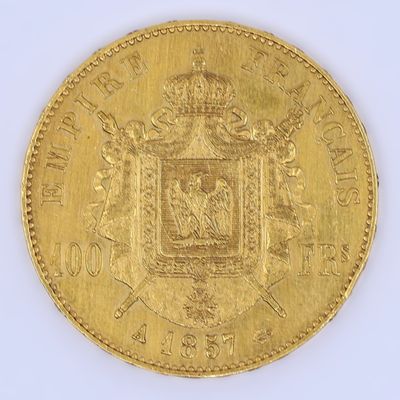 l'image d'une pièce d'or sur laquelle figurent des armoiries