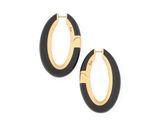 a pair of black and gold hoop earrings on a white background