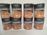 un lot de quatre pots de lasure sur une surface blanche