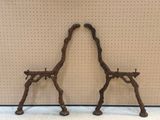 two metal giraffes that are standing next to each other