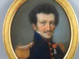 portrait d'un homme en uniforme militaire dans un cadre doré