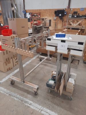 a cart with boxes on it in a warehouse