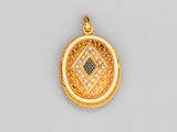 un pendentif en or 18 carats et diamants