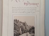 an old book with a picture of a man and a dog on it