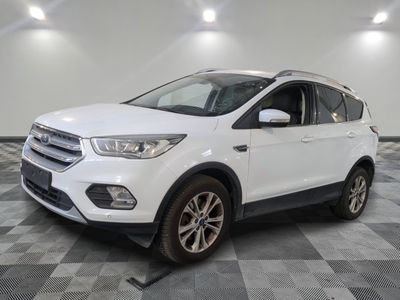 a white ford escape is parked on a checkered floor