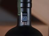 a bottle of wine with a qr code on it