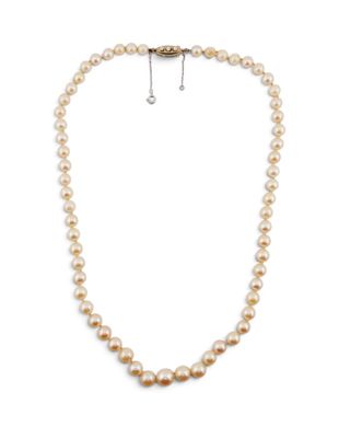 a single strand of pearl necklace with a silver clasp